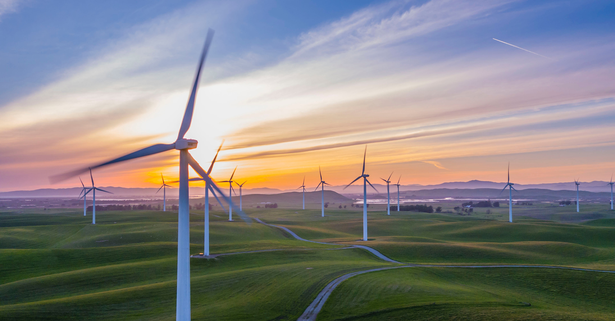 Photo of Wind turbines in field