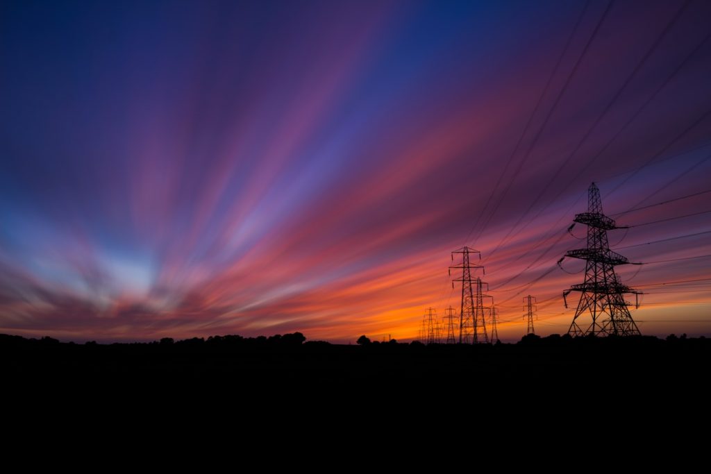 Photo of powerlines during sunset