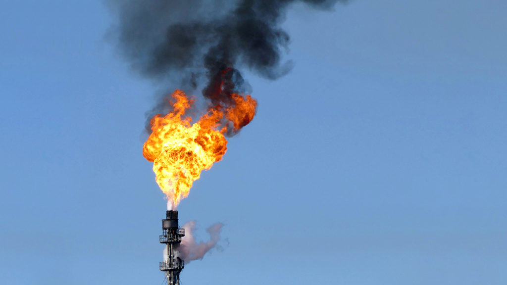 An image of a gas flare coming out of a pipe.