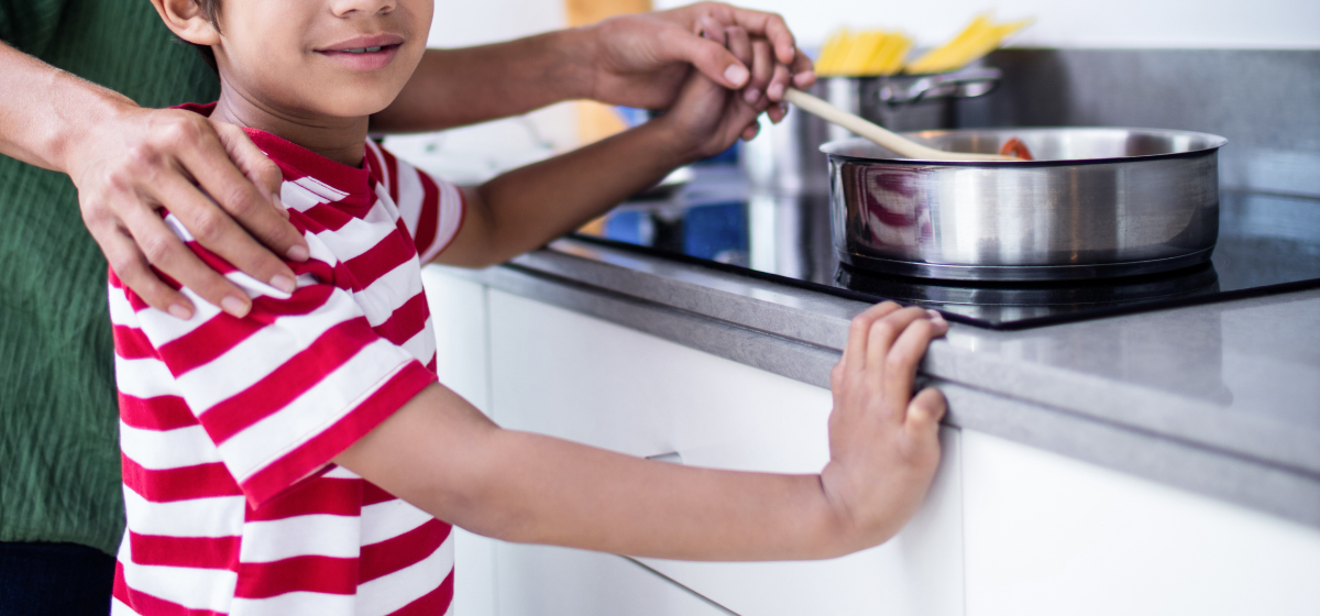 mum and child cooking on induction