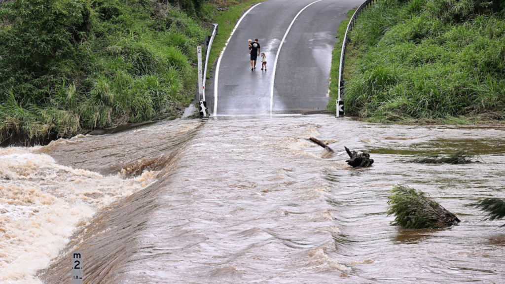 Family walks away from flood