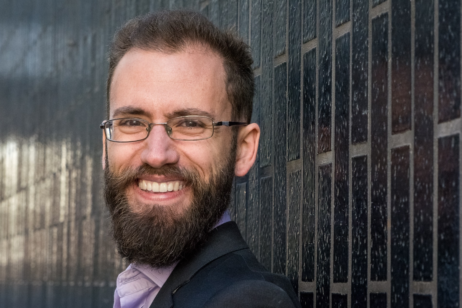 A headshot of Joel Gilmore.