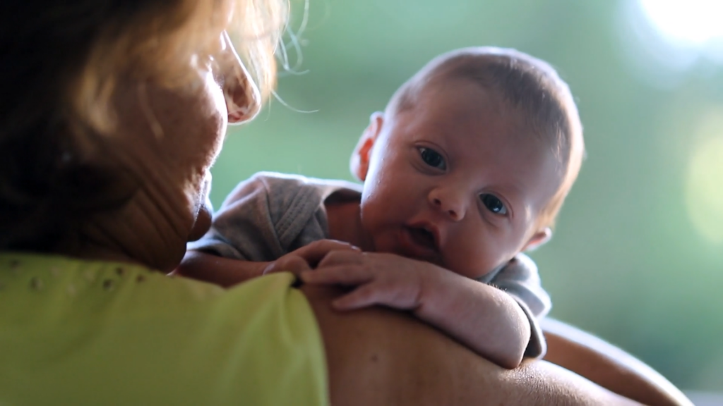 Grandma holding baby